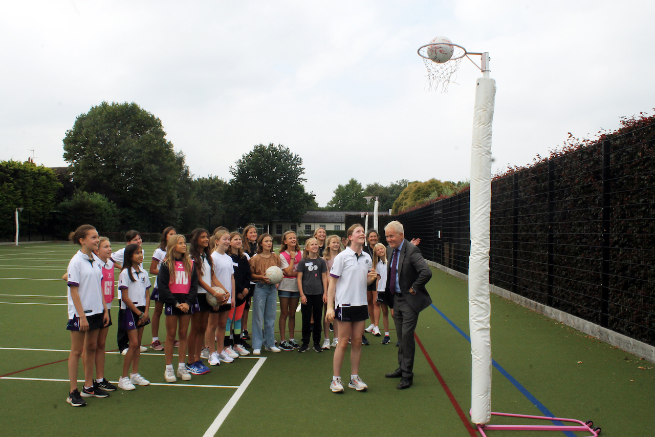 11s%20pupil%20Isla%20scoring%20in%20netball.jpg