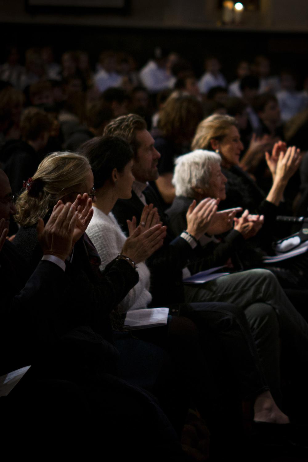 The appreciative audience includes the Headmaster's mother