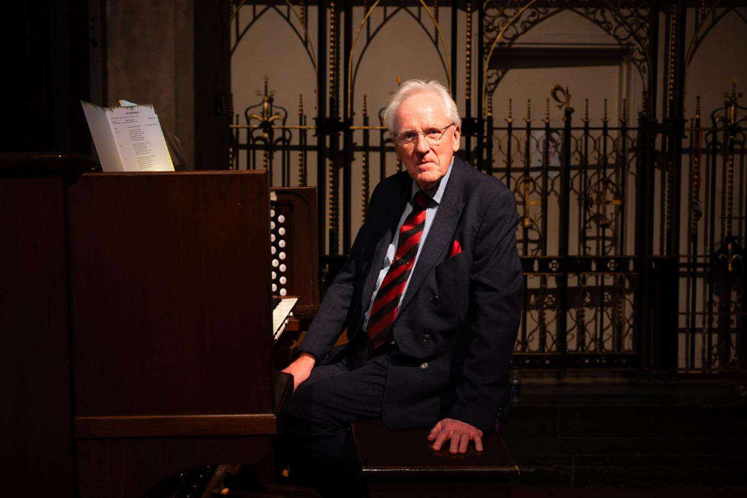 Sir Andrew Parmley, Principal of Harrodian and organist