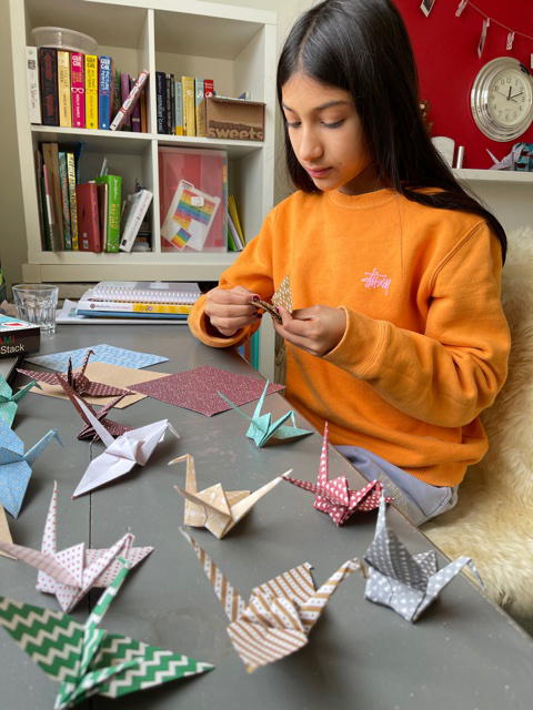 Sasha%20making%20cranes.jpg