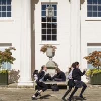 Harrodian preppers running in senior courtyard