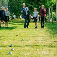 Harrodian headmaster at boules club