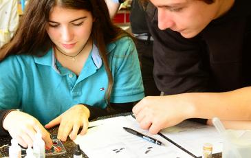 Girl and boy scientists